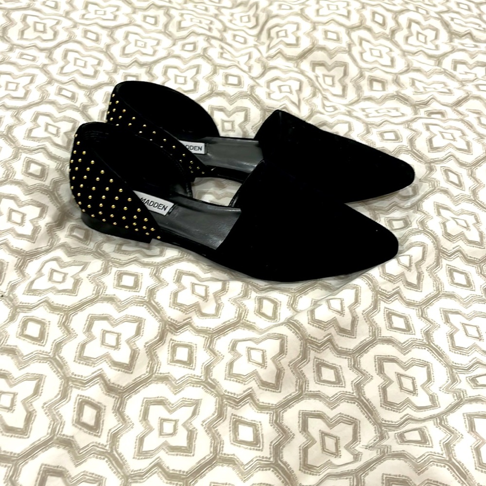 Steve Madden black flats with stud details on the heel.